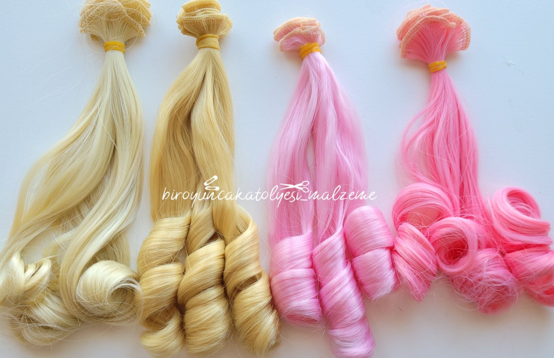 SENTETİK UCU BUKLELI SAÇ 20CM