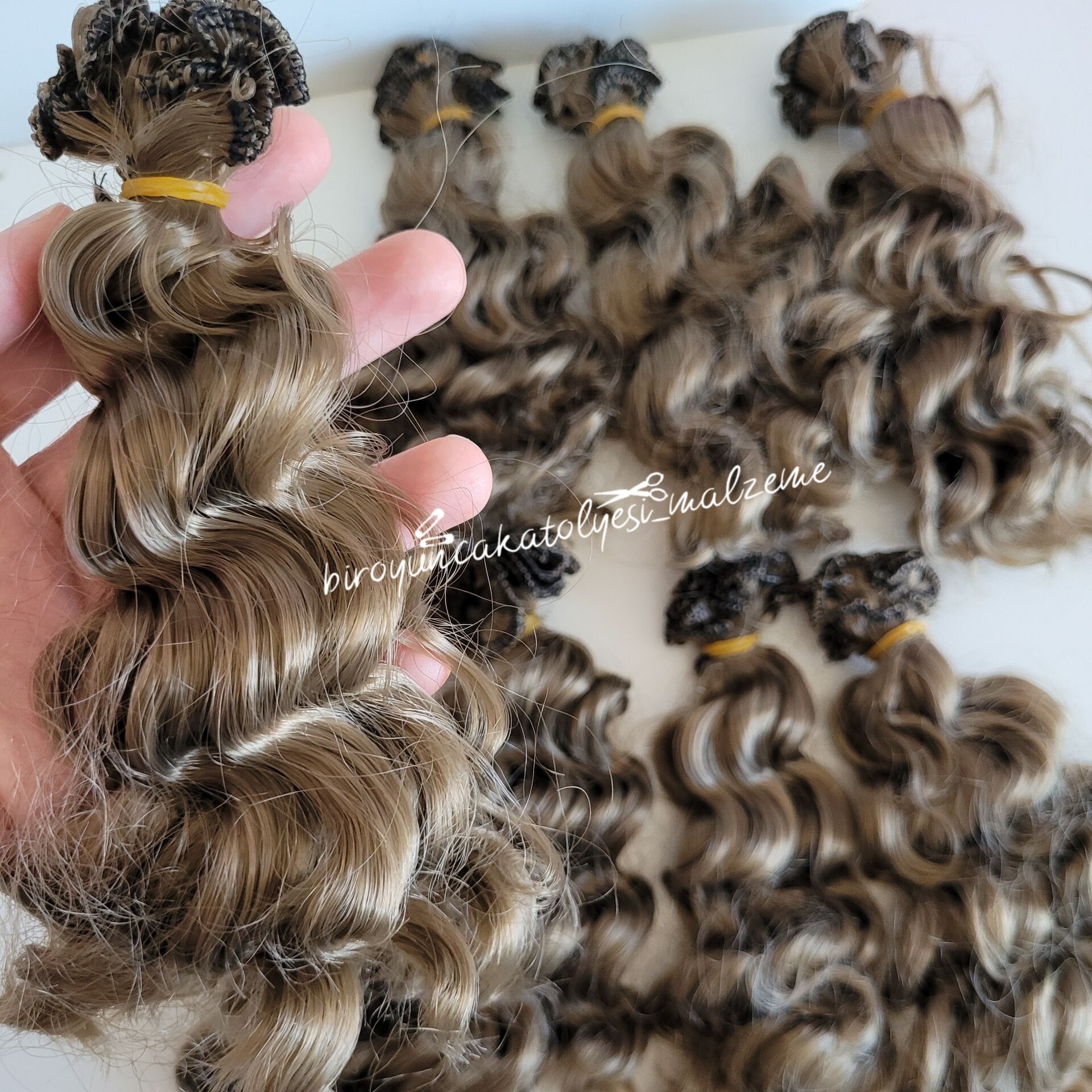 BUKLELİ SAÇ (15- 18 CM Arası)