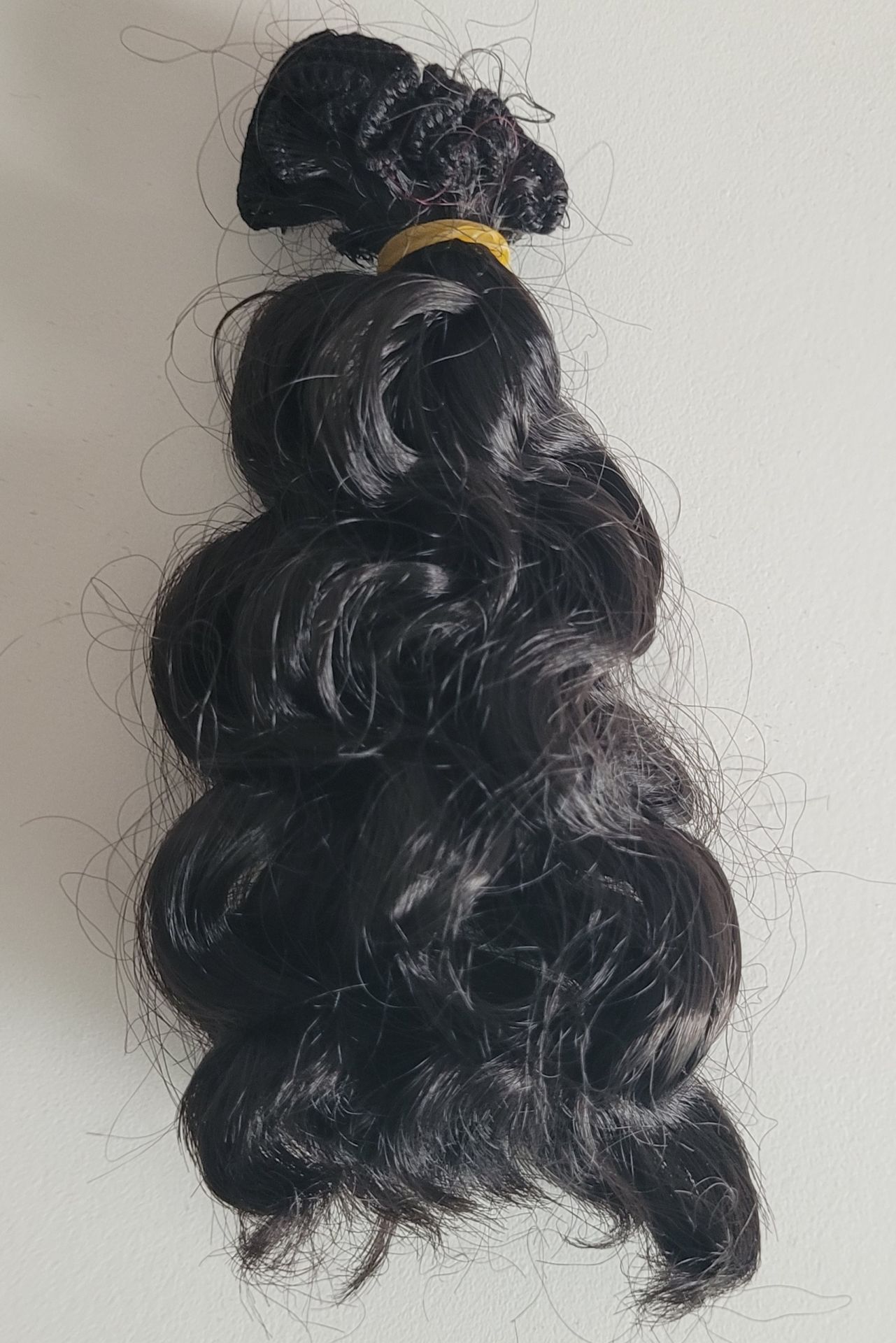 BUKLELİ SİYAH SAÇ (16-18CM Arası)